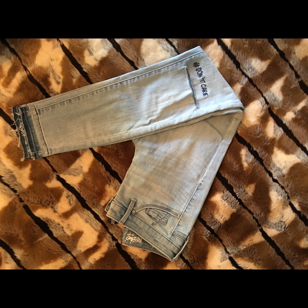 ‘Don’t Care’ distressed jeans